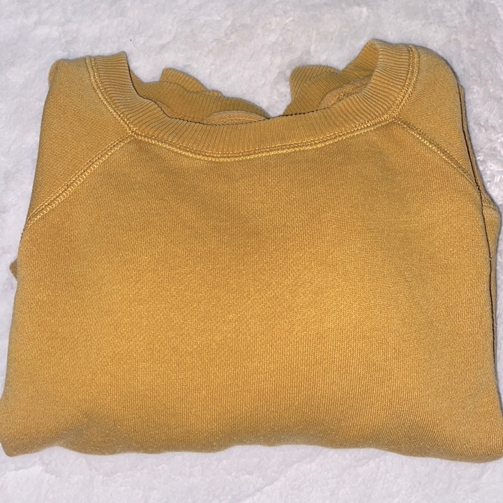 yellow sweatshirt